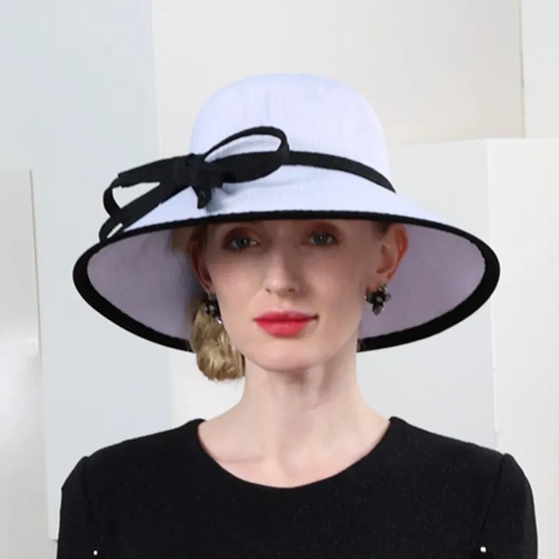 EE 1109  new elegant Audrey Hepburn wind restoring ancient ways the party hat is prevented bask in large eaves joker hat woman