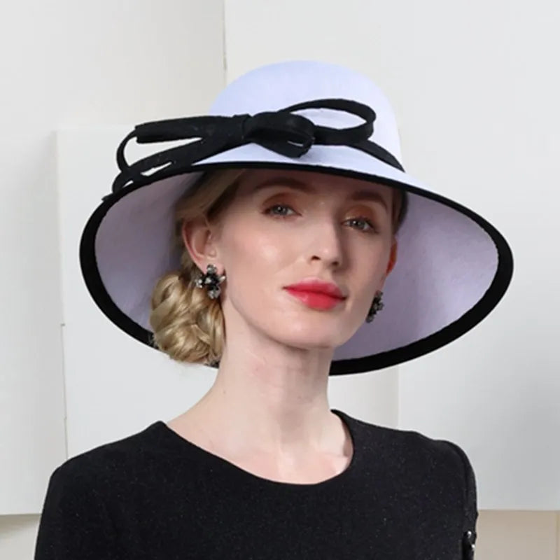 EE 1109  new elegant Audrey Hepburn wind restoring ancient ways the party hat is prevented bask in large eaves joker hat woman