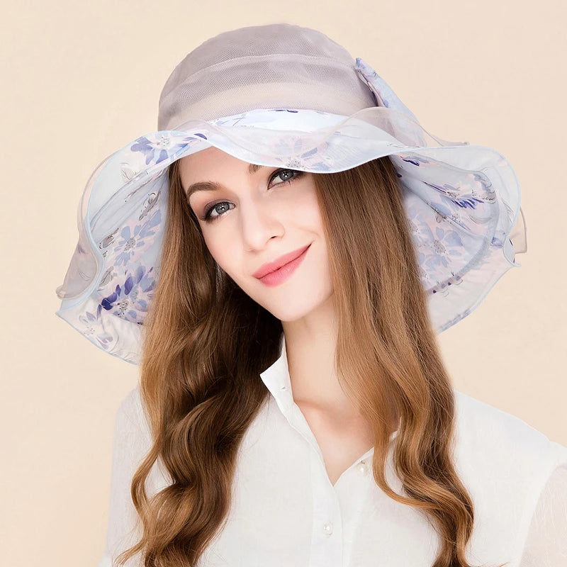 EE 4063 Spring and Summer/Stylish/Elegant Feminine Style/Big Bowknot/Mulberry Silk/Sun Protection/Tulle Fabric Hats Headpiece